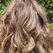 It is a close up of a woman 's hair.