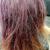 A close up of a person 's hair in a salon.