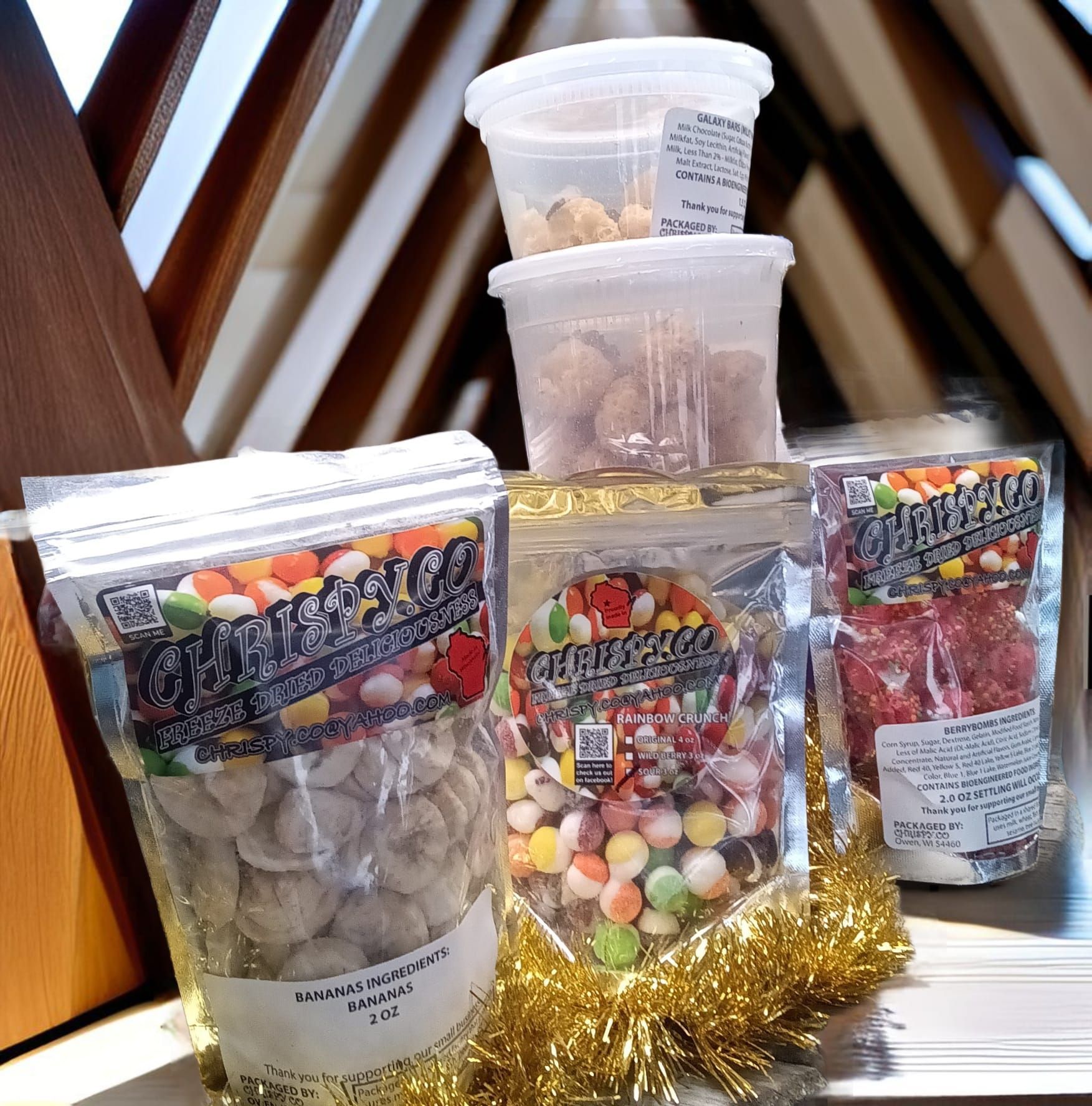 Several bags of food are stacked on top of each other