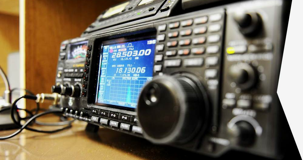 A radio is sitting on a table with a screen that says ' a ' on it