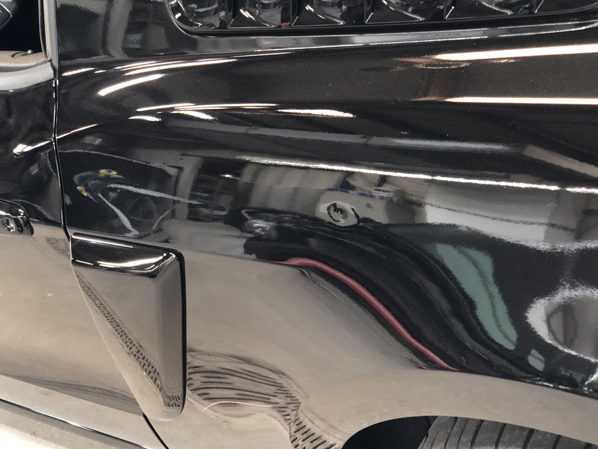 Before paintless dent repair