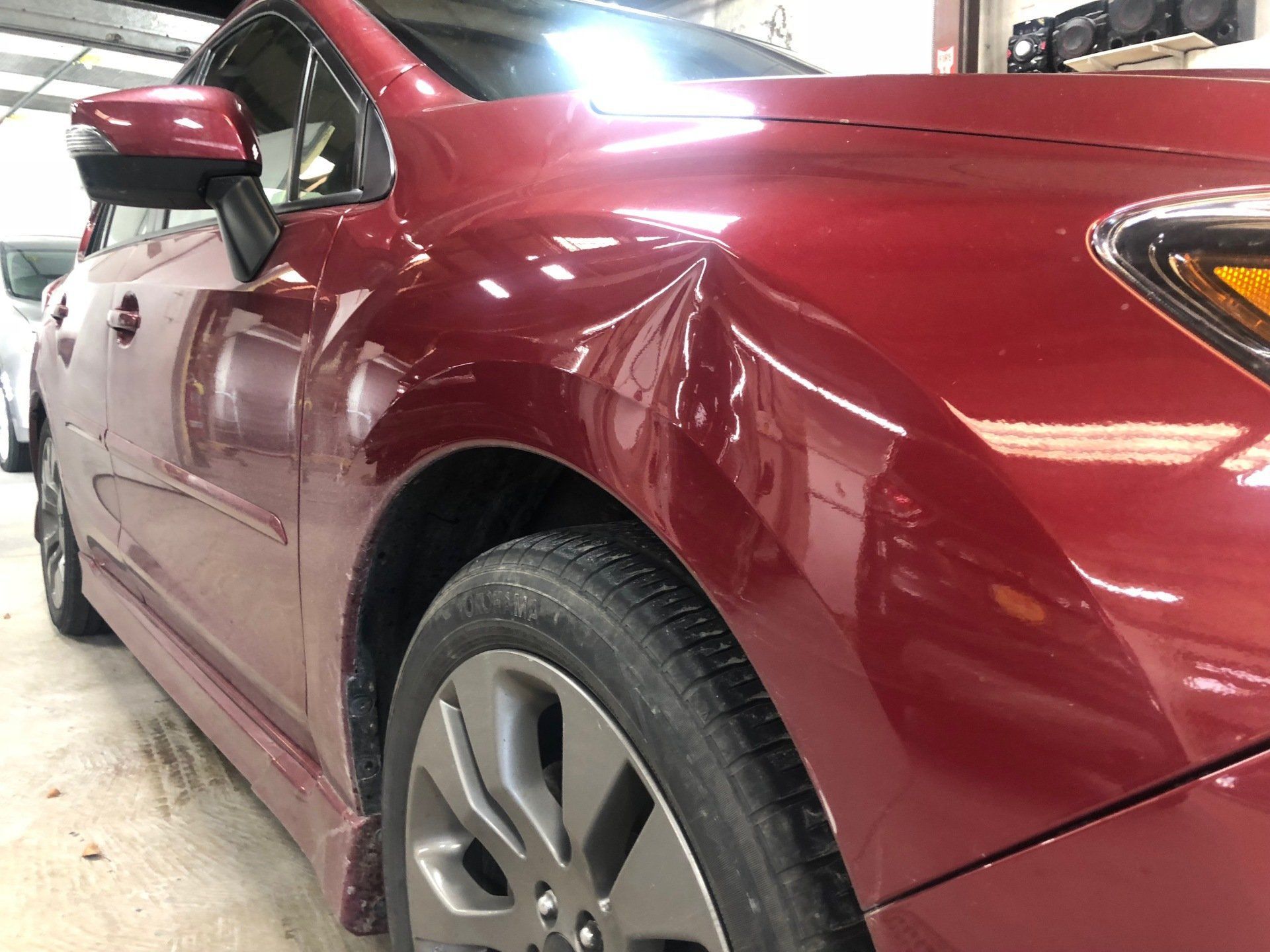 Before paintless dent repair