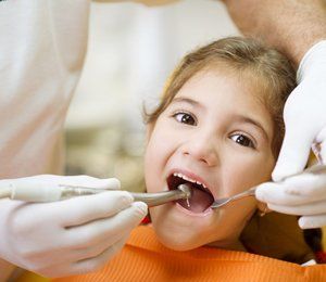 Little girl having her dental checkup