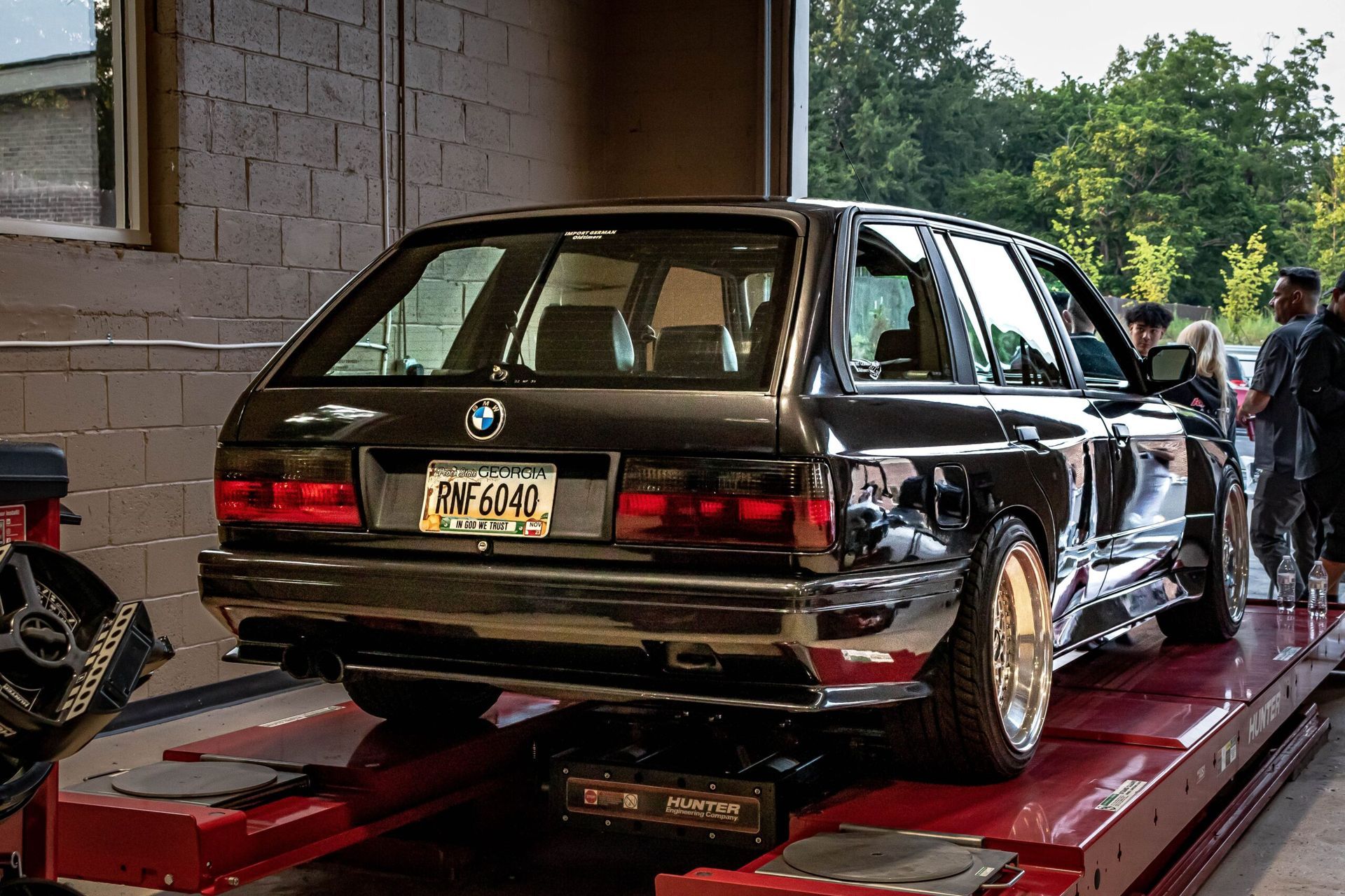 A black bmw with a new york license plate