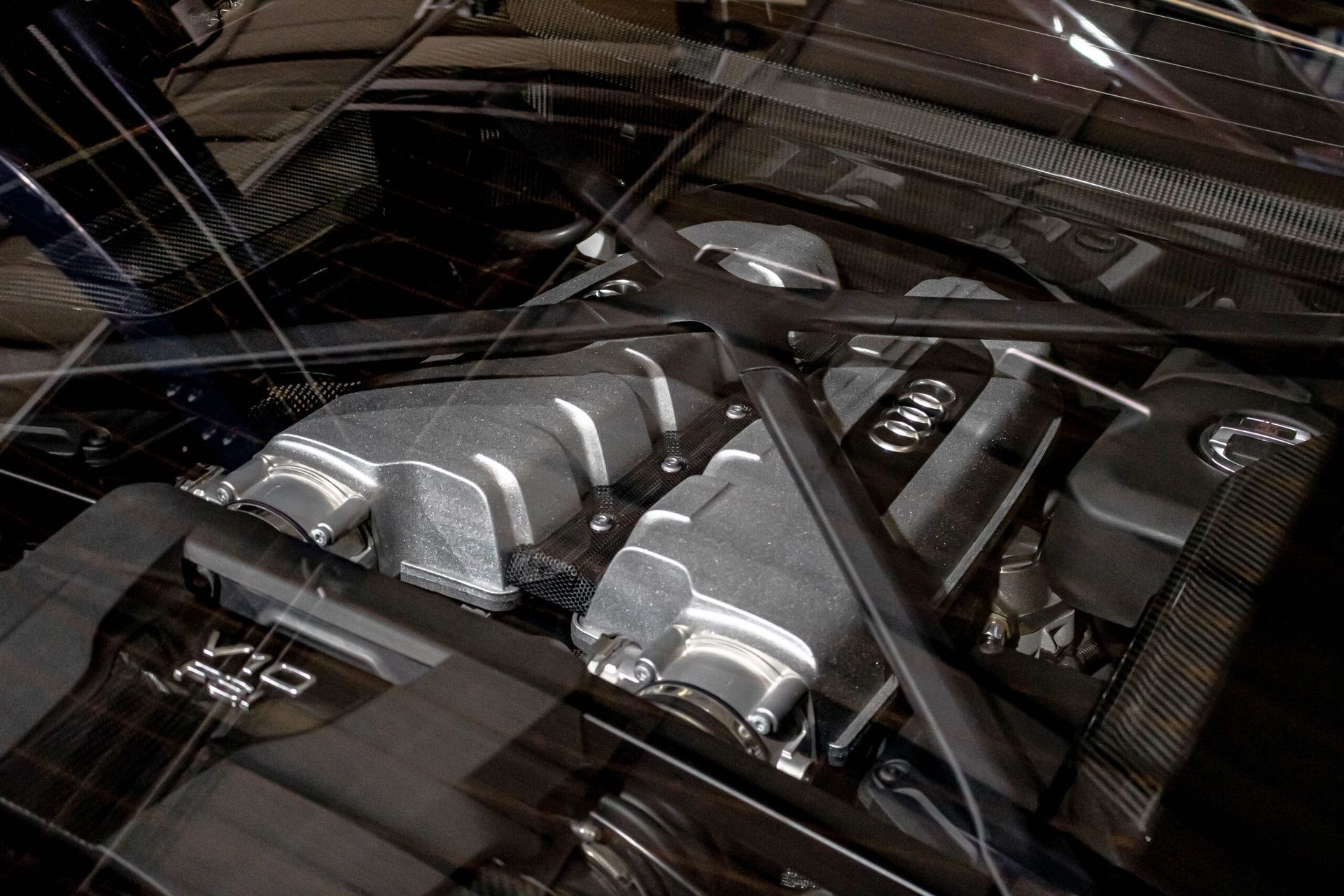 A close up of the engine of an audi car