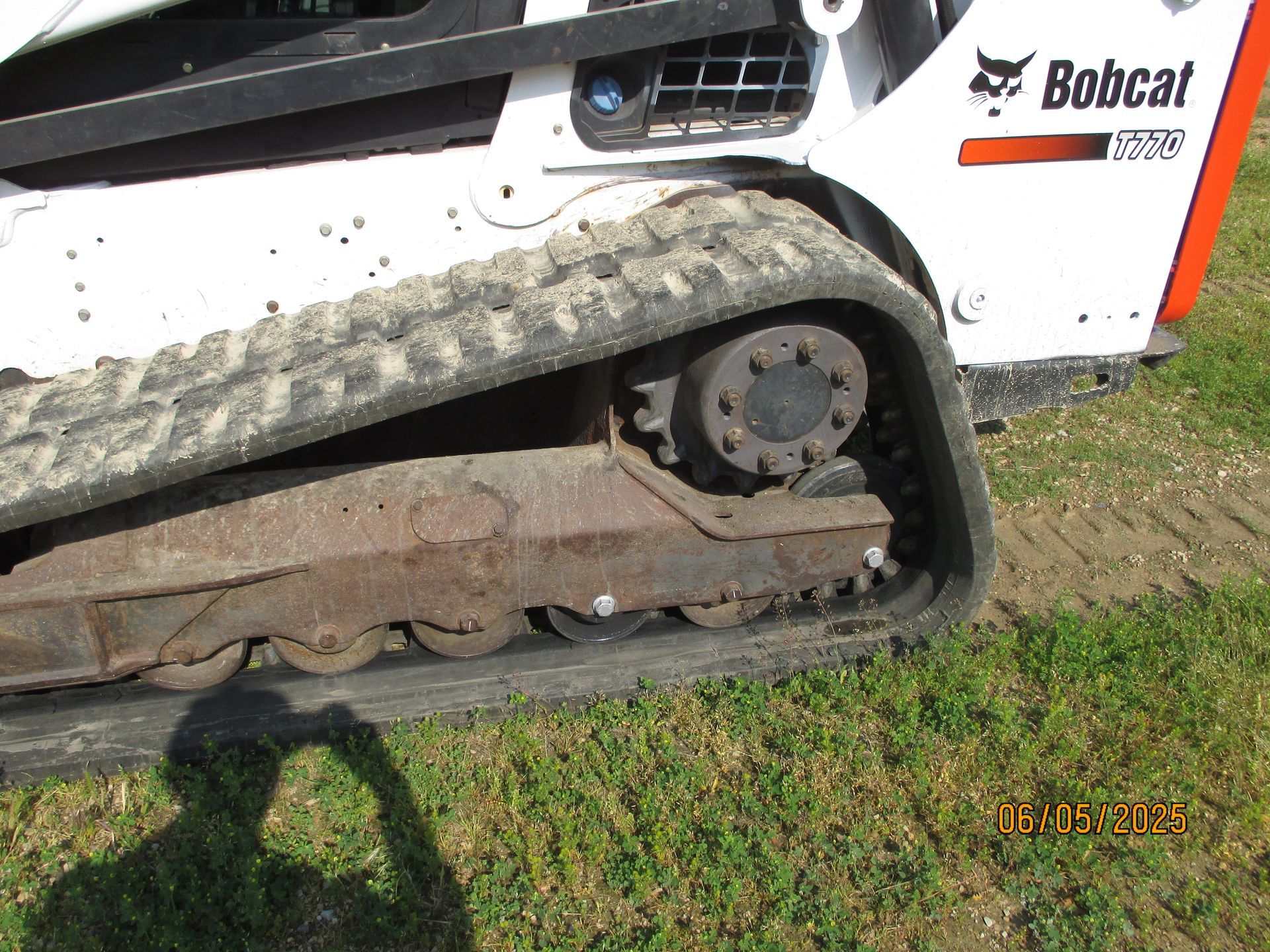 A bobcat tractor is parked