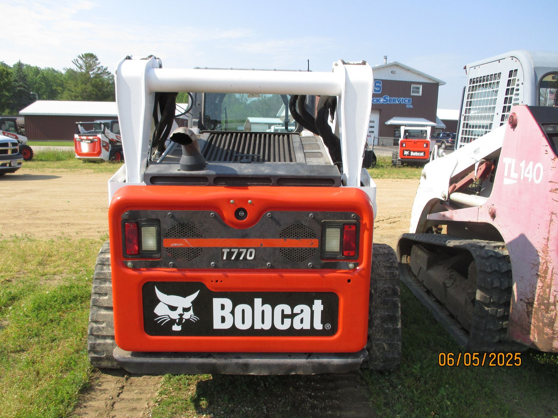 A bobcat tractor parked outside
