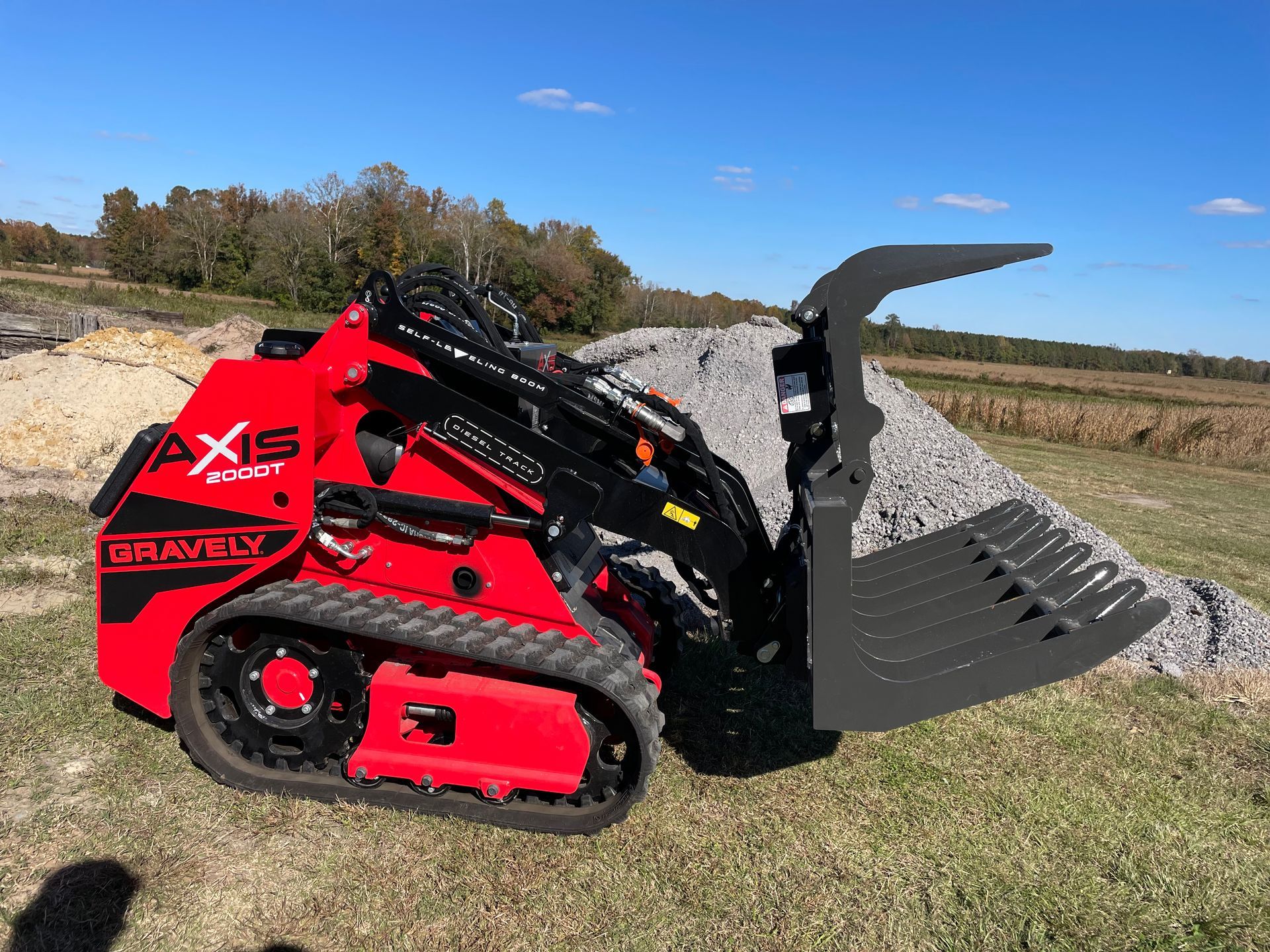 Roger Fowlers Gravely Mini Skid Steer for sale with multiple attachments in ssuffolk