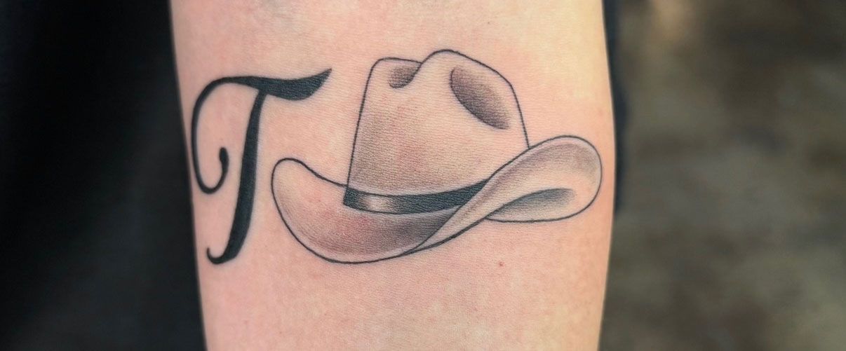 Tattoo of the letter 