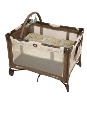 A brown and white playpen with a mattress and a toy arch.