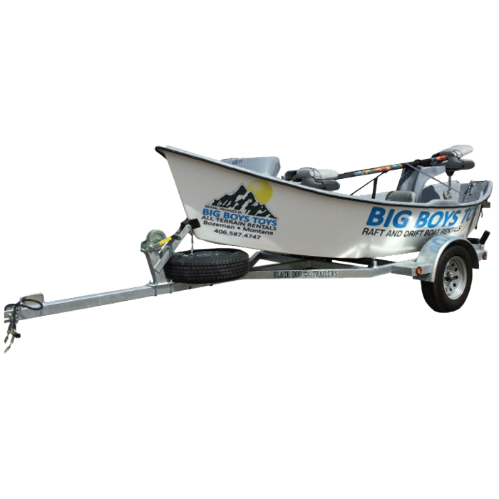 A white boat on a trailer that says big boys