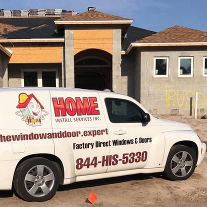 White service van with HOME Windows & Doors branding parked in front of a house under construction.