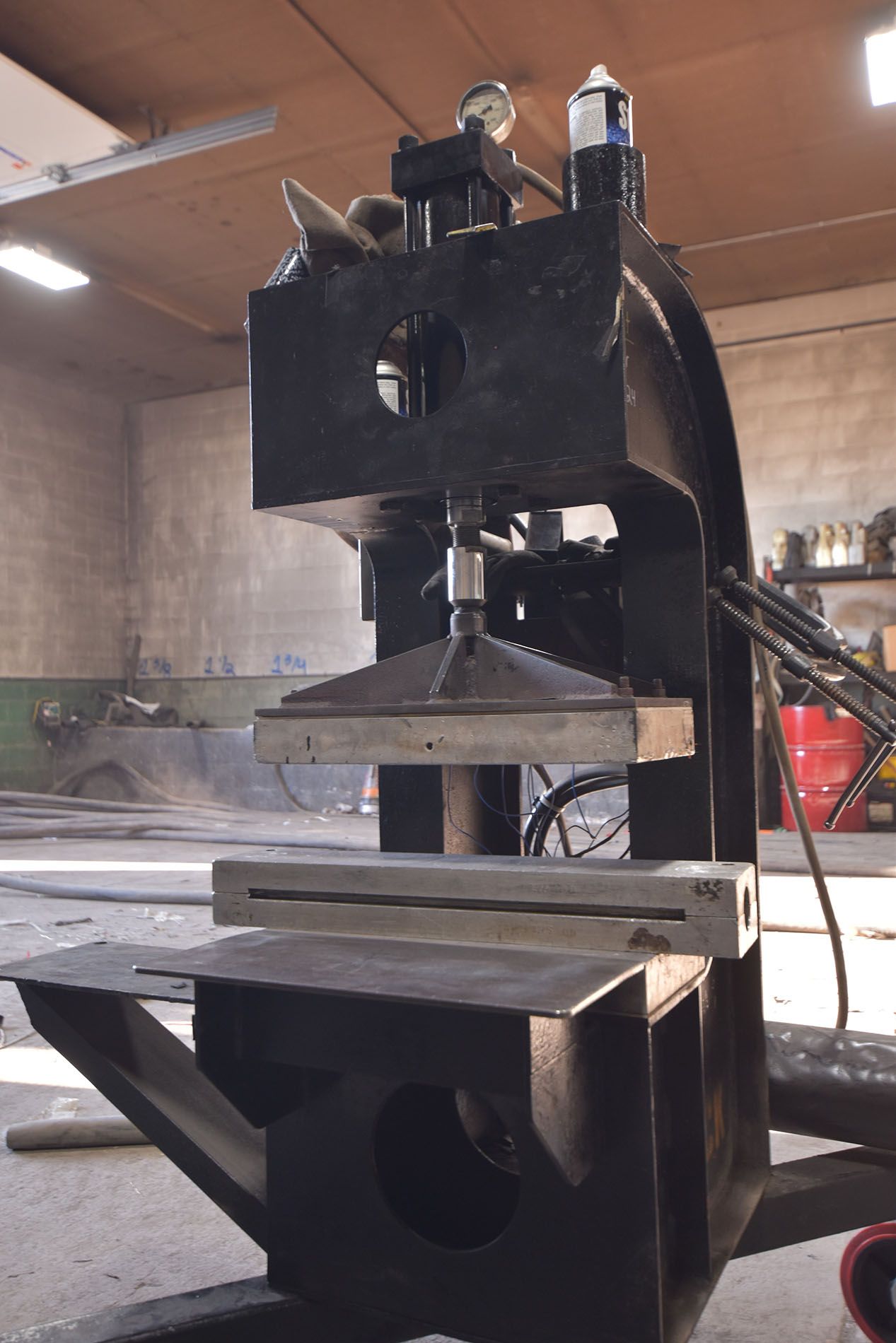 A machine is sitting in a room with a ceiling fan.