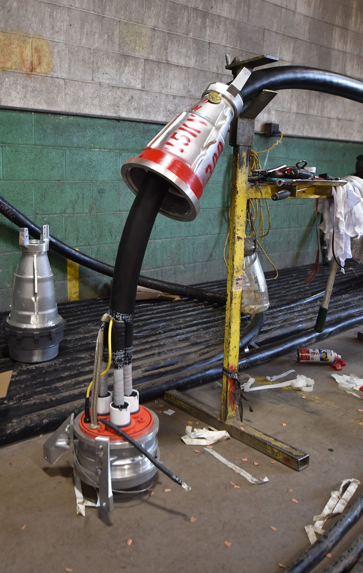 A vacuum cleaner with a hose attached to it that says bosch on it