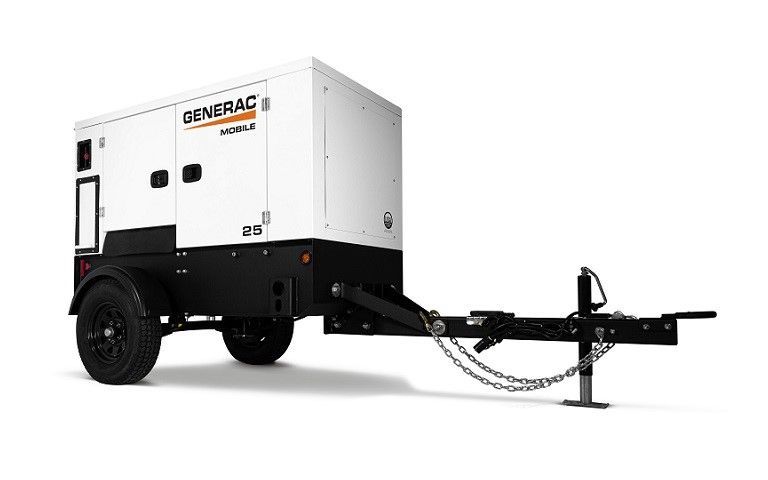 A generator is attached to a trailer on a white background.