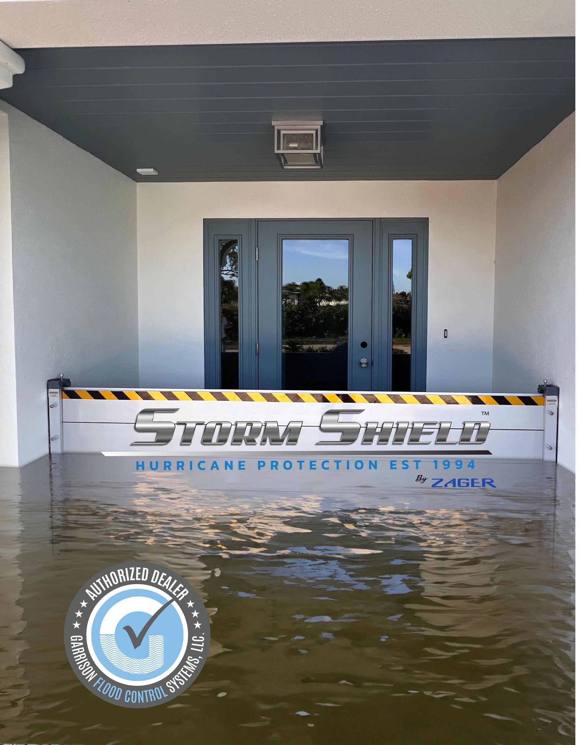 Flood barrier protecting a doorway from floodwaters; silver and black; logo visible.