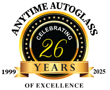 A logo for anytime autoglass celebrating 26 years of excellence.