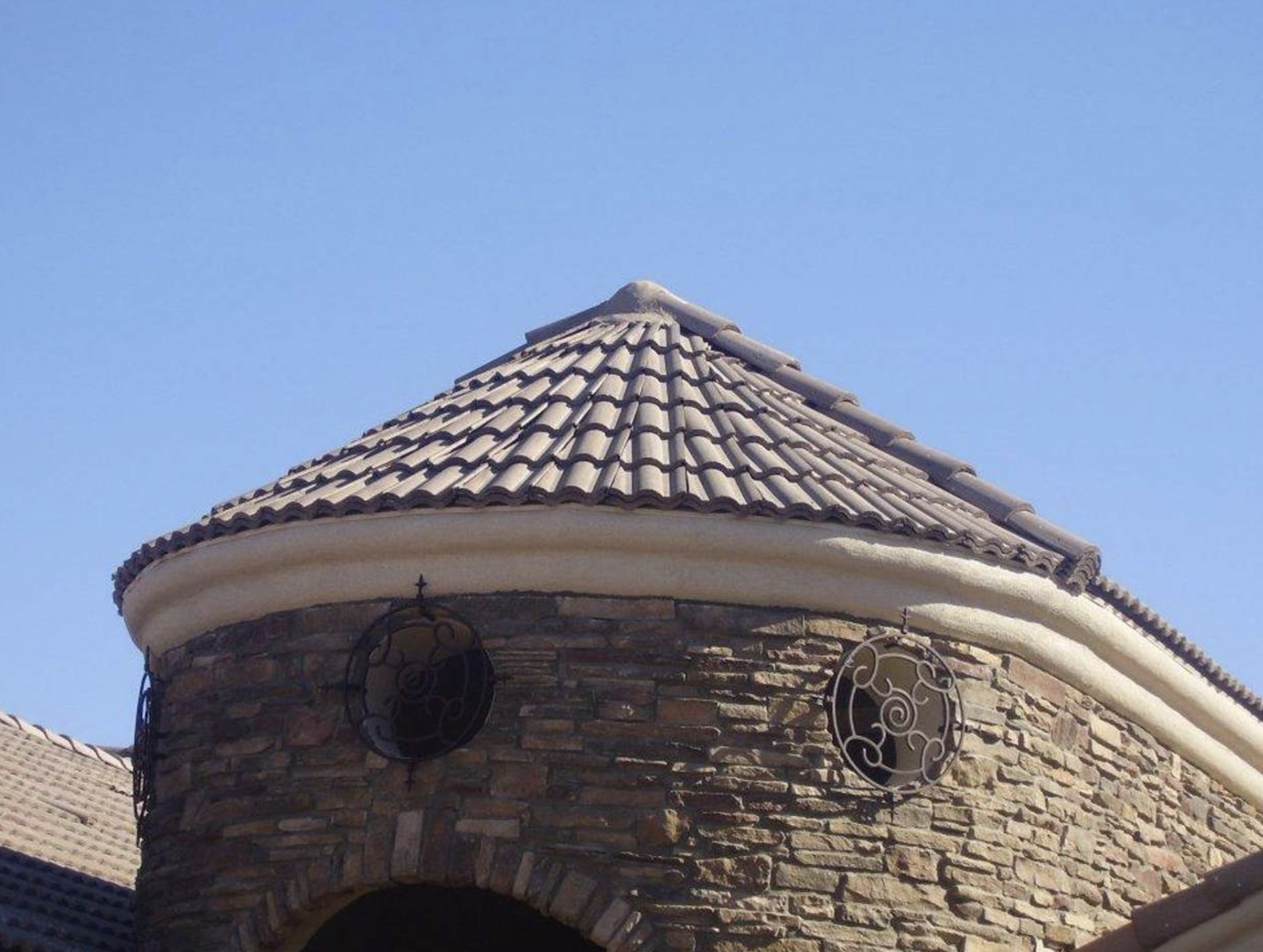 a stone building with a roof that looks like a dome