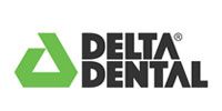 Delta Dental logo with green triangle icon and black text on a white background