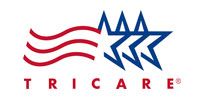 TRICARE logo with red and blue stars and stripes on a white background