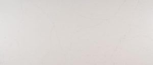 Blank white surface with faint gray smudges and a few light marks