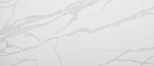 White marble surface with subtle gray veining and a light, polished texture