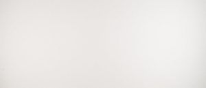 Blank white wall with a dark shadow along the bottom edge