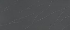 Dark gray textured surface with faint white scratches and lines
