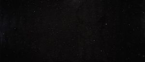 Dark, starry night sky with scattered faint stars
