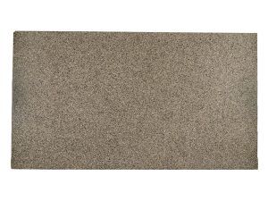 Close-up of a beige, textured fabric or carpet surface