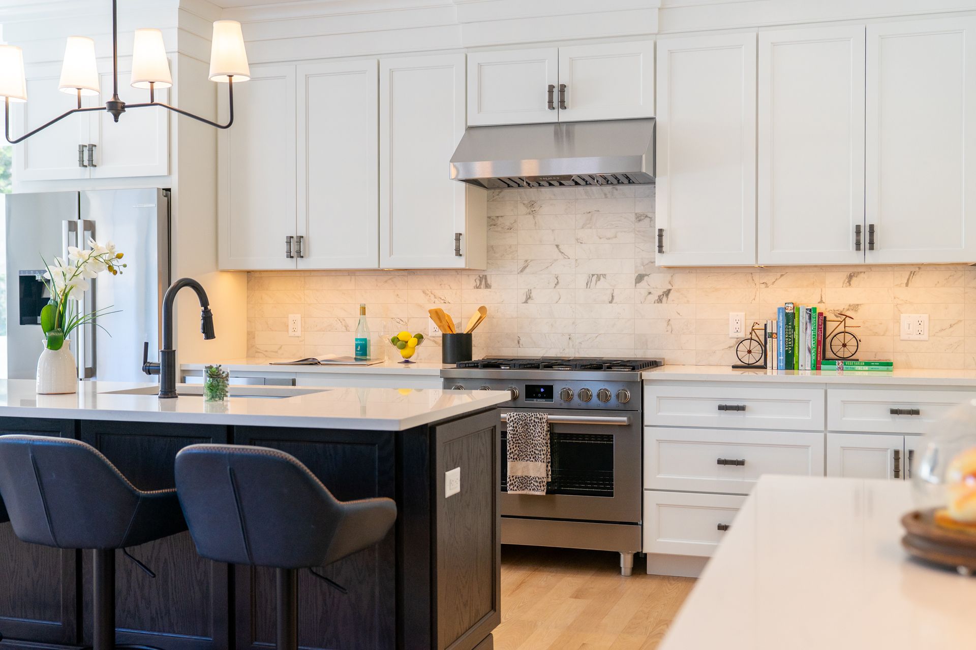 Modern kitchen with island cabinets, and white marble countertop