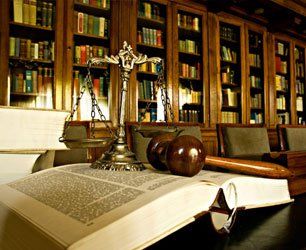 Gavel and scales of justice on a book