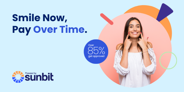 A woman is smiling in an advertisement for sunbit