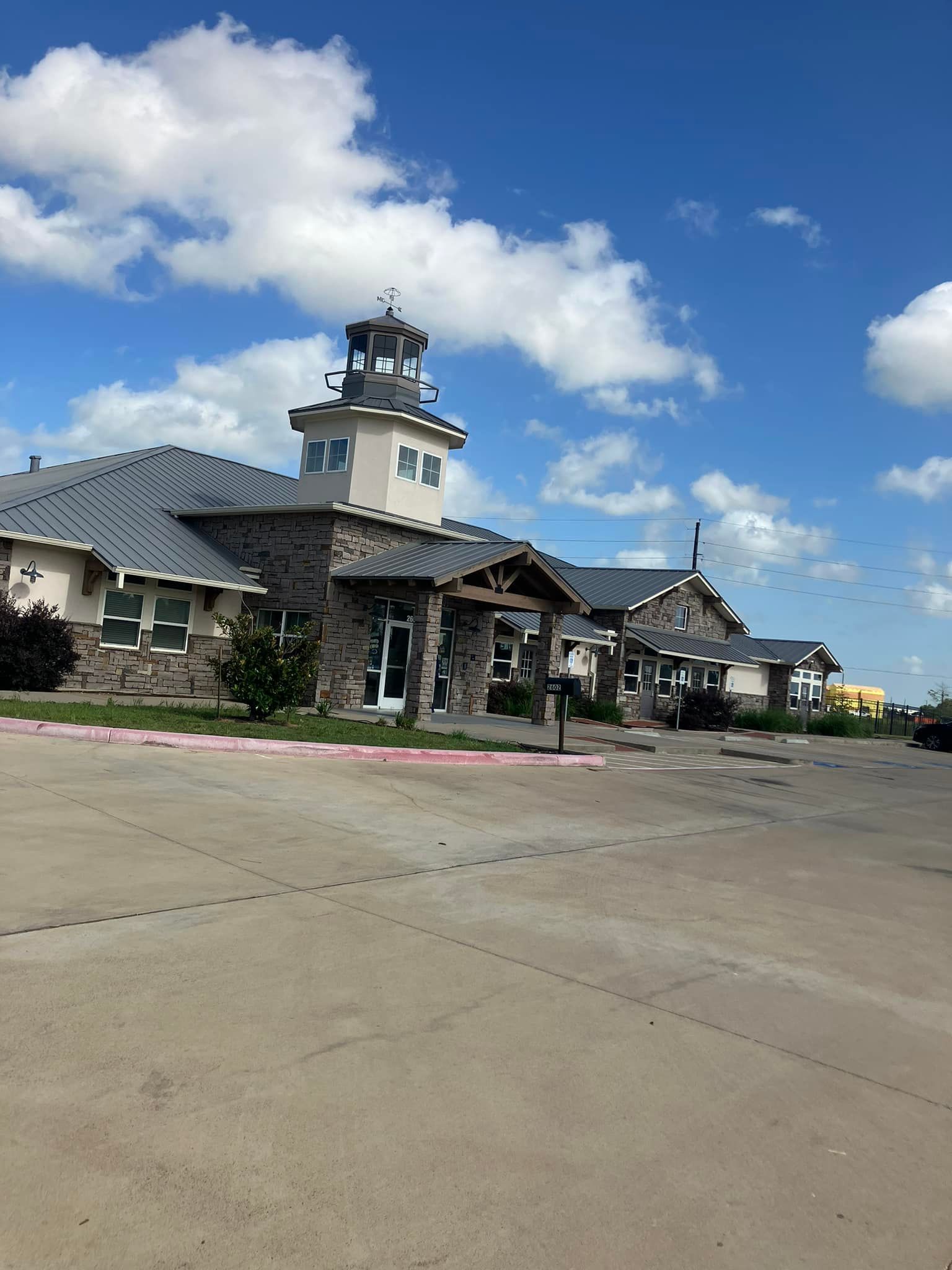A large building with a clock tower on top of it.