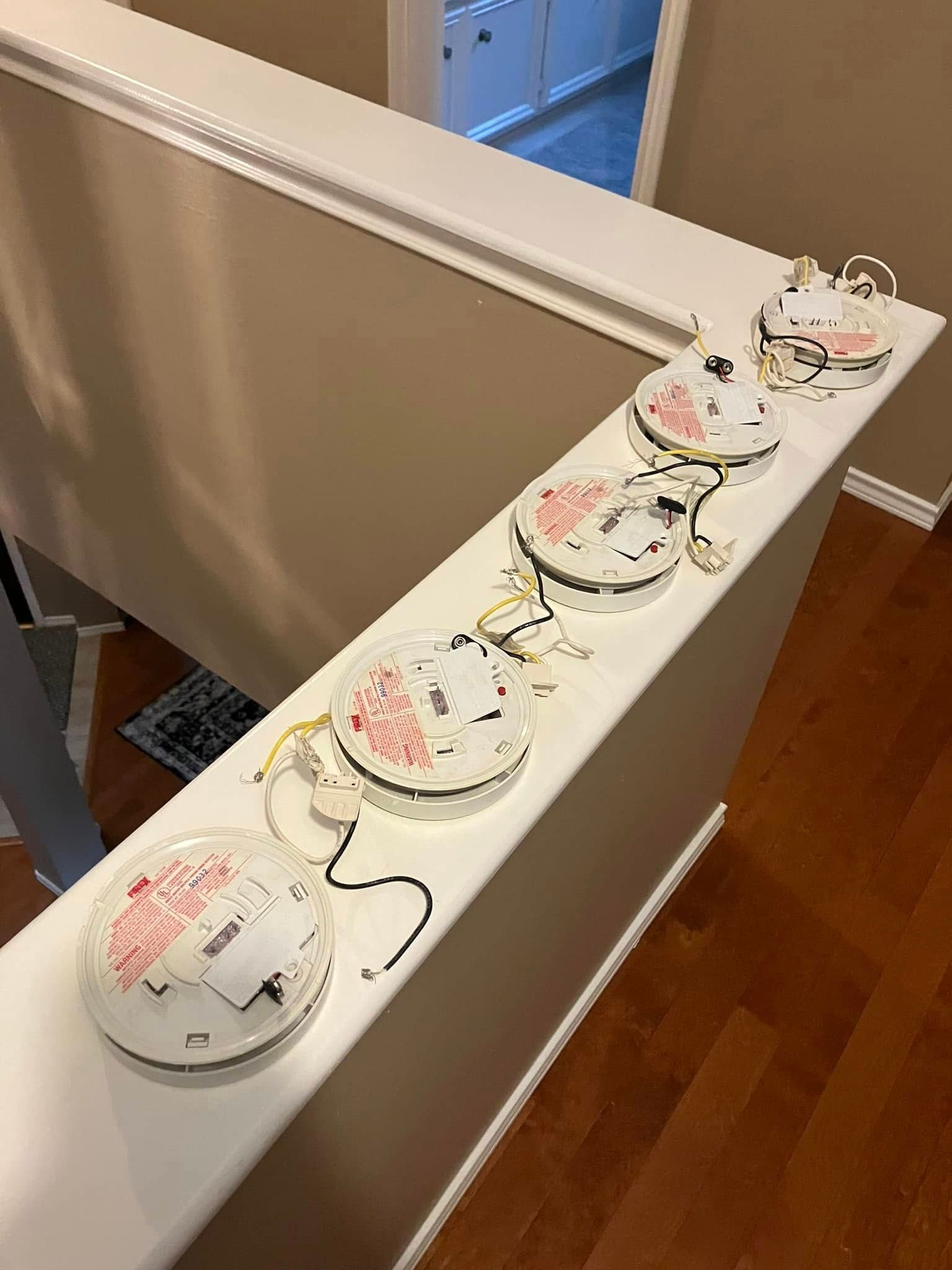 A row of plates sitting on top of a white counter.