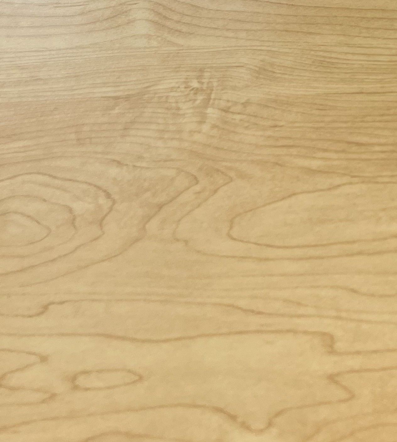 Light tan wood grain surface background