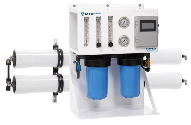 White water filtration system with blue filter canisters and control panel connected to four horizontal filter cartridges