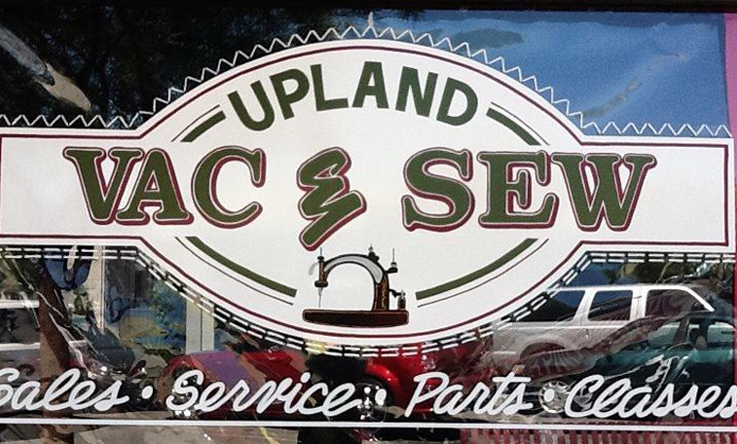 Upland Vacuum & Sewing signage