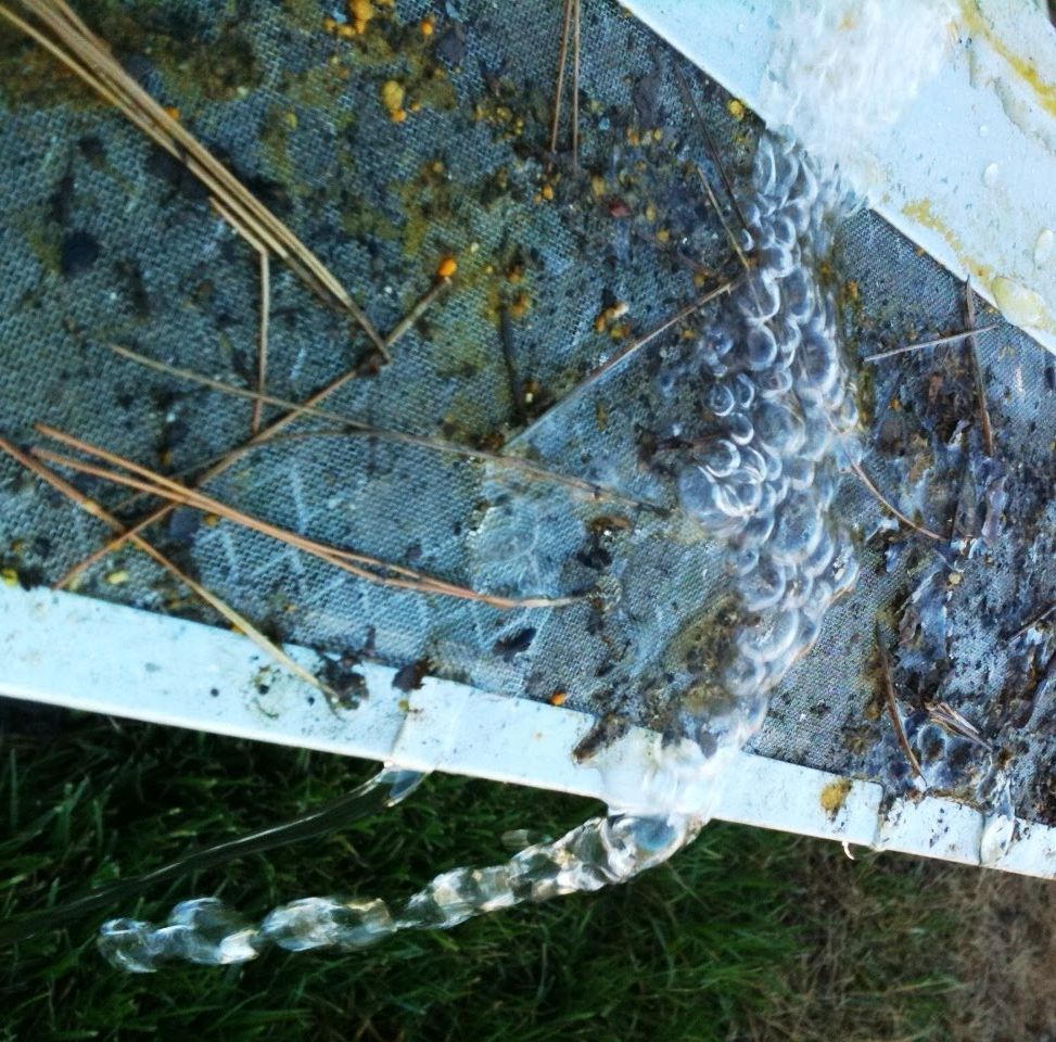 water flowing out of a screen