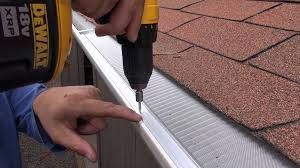 gutter cover bending roof shingles