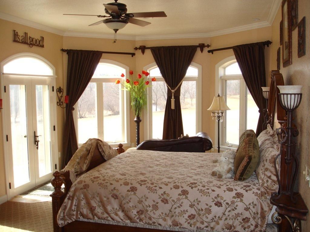 Bedroom with a view of the outside