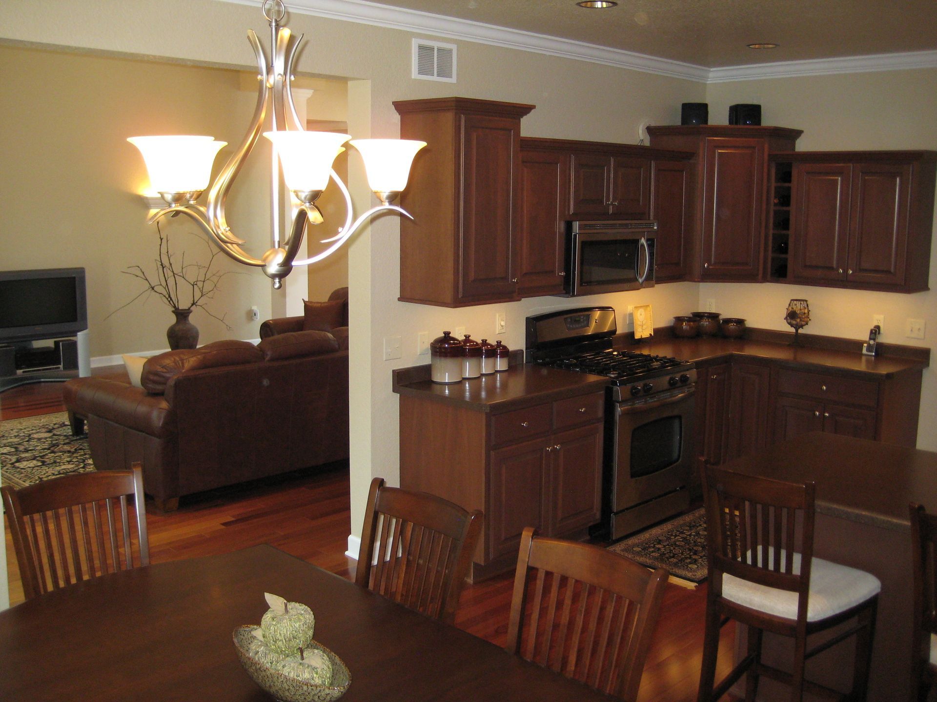 Kitchen with dark brown cabinets