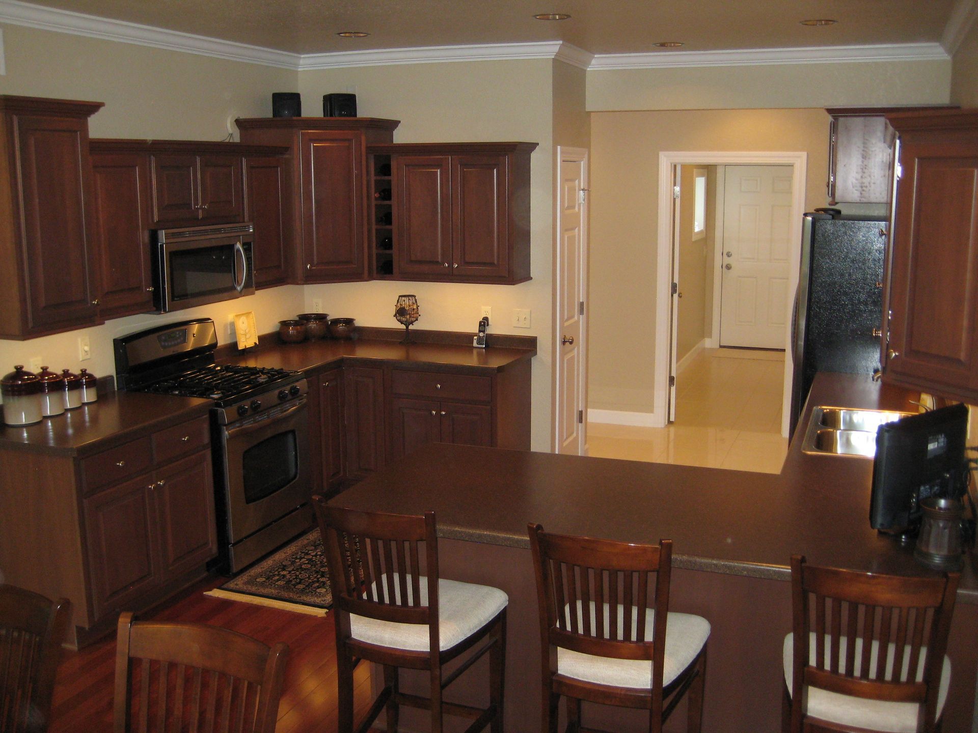 Kitchen with bar table and chairs