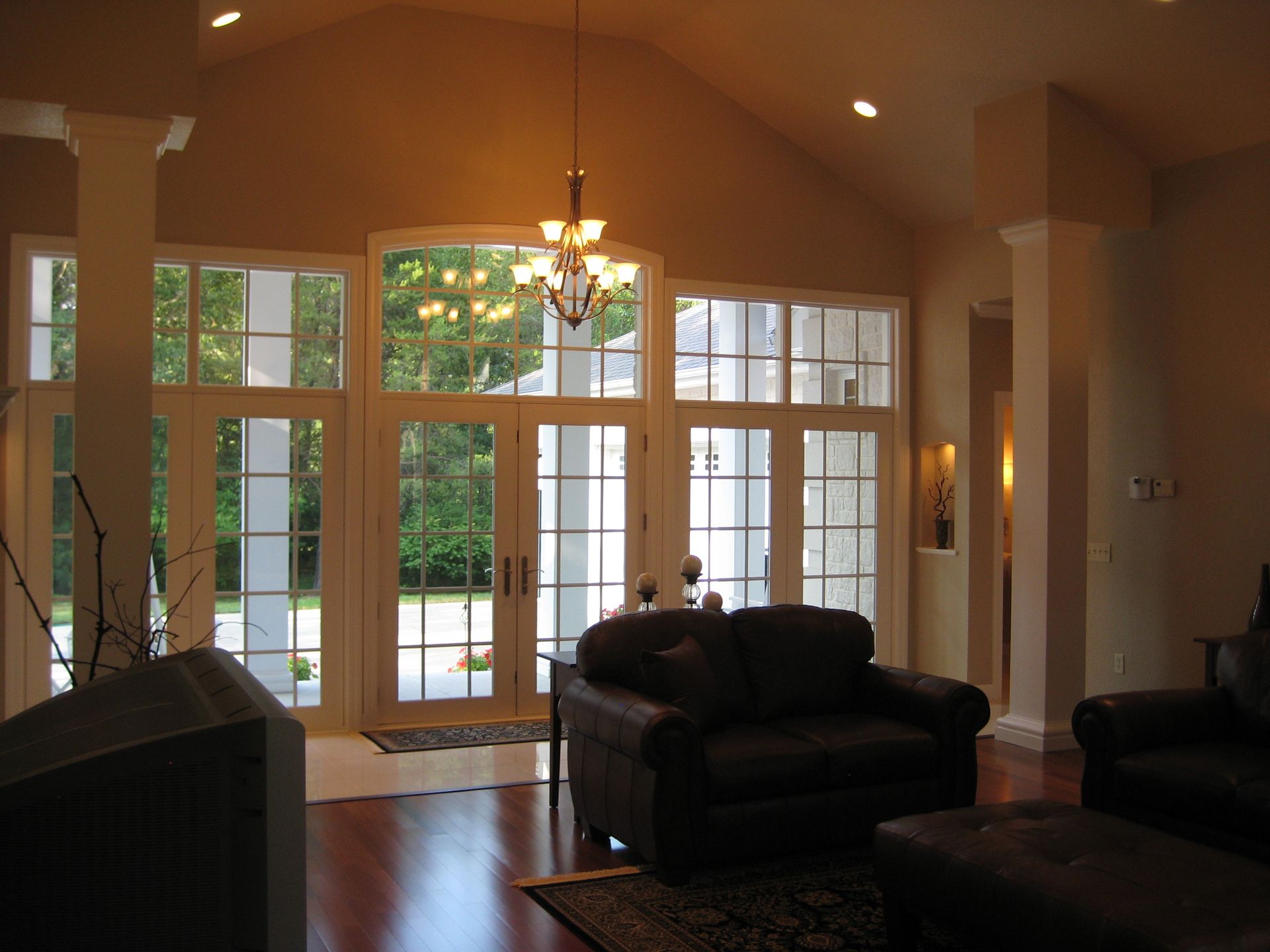 Living room with windows and door