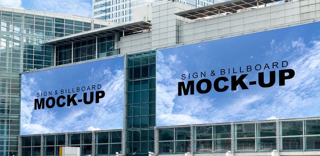 Blue building facade with large “MOCK-UP” banner and signage board mock-up display