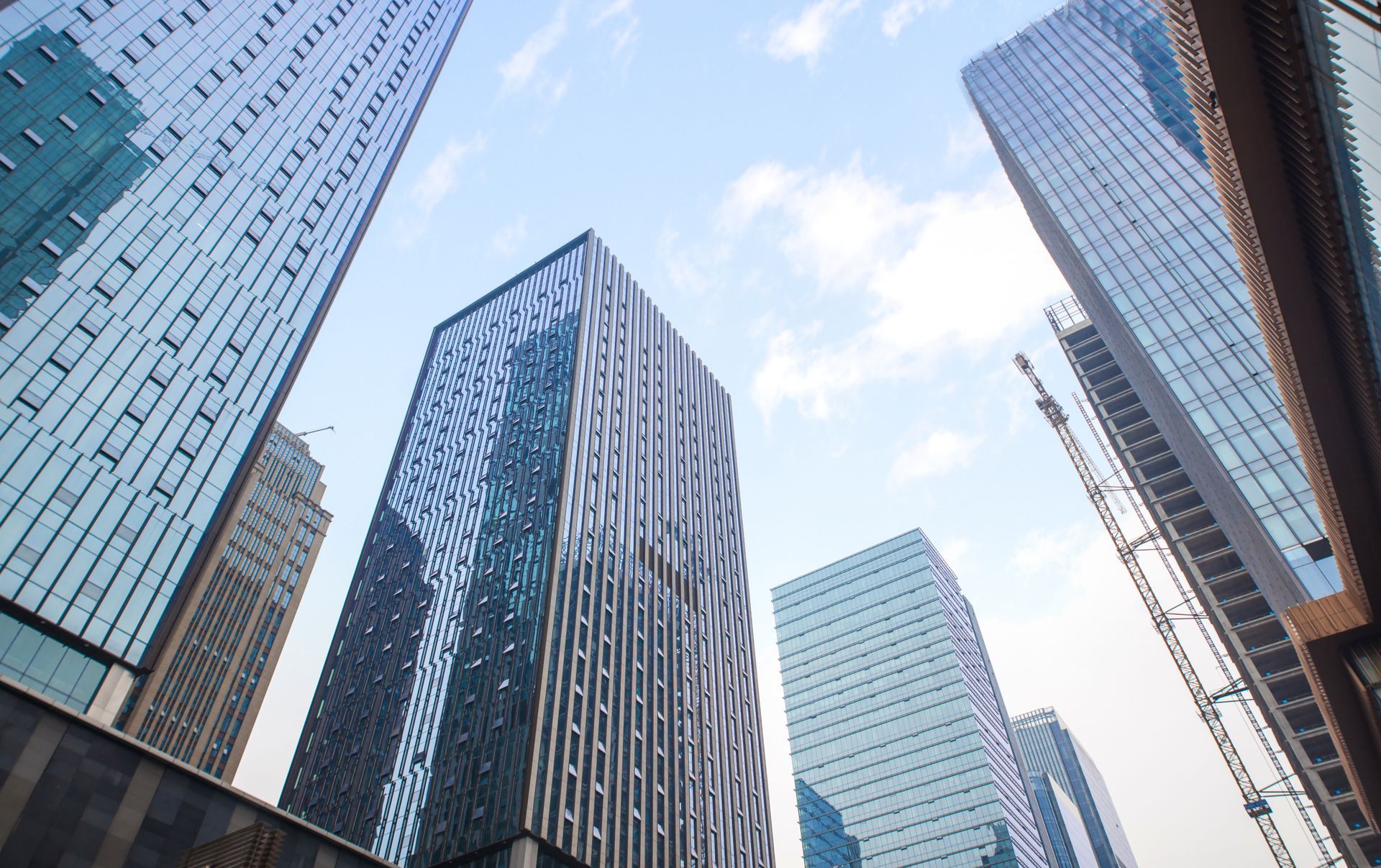 Skyscrapers against a blue sky; modern architecture.