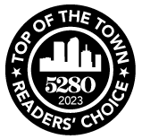 A black and white logo for top of the town readers ' choice.