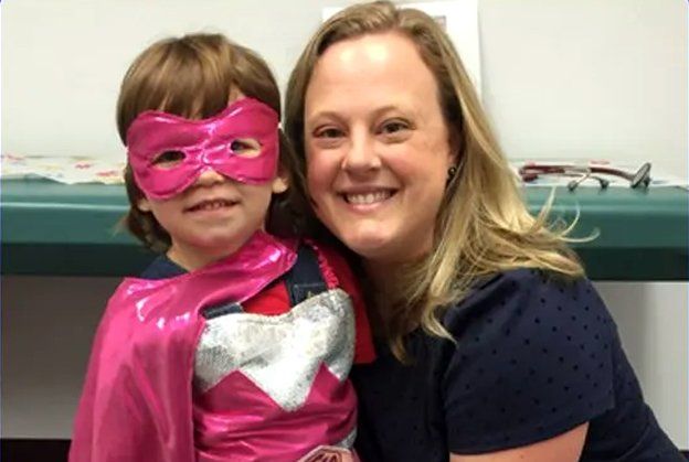 Learn More About Contacting Us Pediatrician with a patient