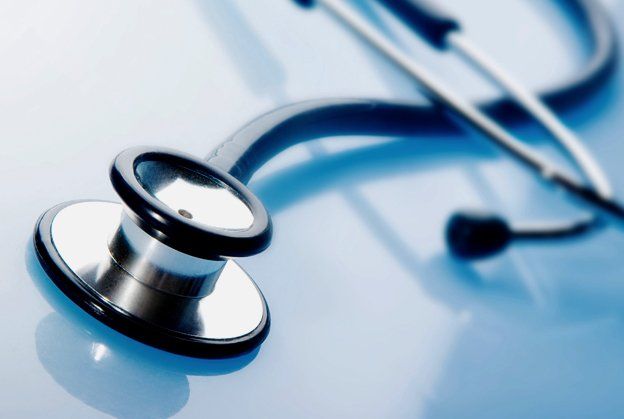 Learn About Our Doctors Stethoscope on a table