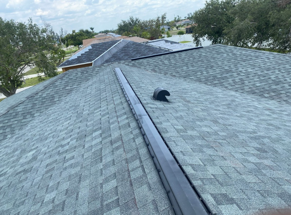 A close up of a roof with a vent on it
